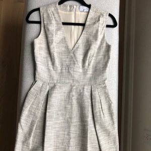 Adam Lippes dress in Cotton Linen that’s beige and black w discreet pockets